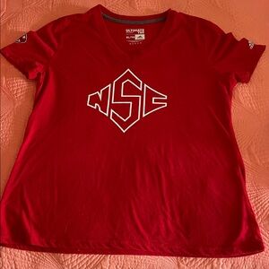 NC State monogram shirt featuring 125 years of NC State Football